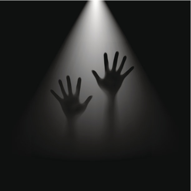 在背光的手。图片下载