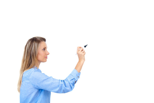 年轻的女商人用钢笔写字图片下载