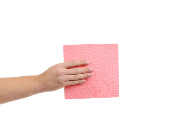 手持粉红色的清洁海绵。图片下载