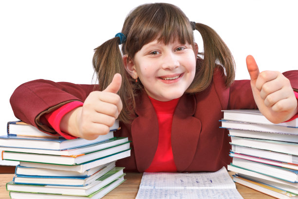 女学生，作业和一堆书图片下载