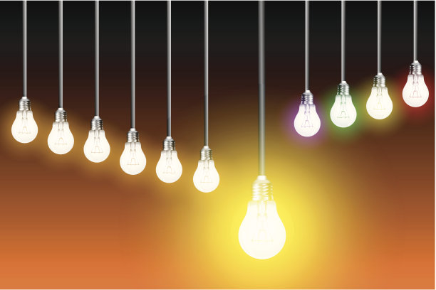 橙色背景上的灯泡图片下载