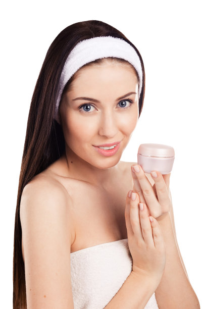 年轻女子使用面霜图片下载