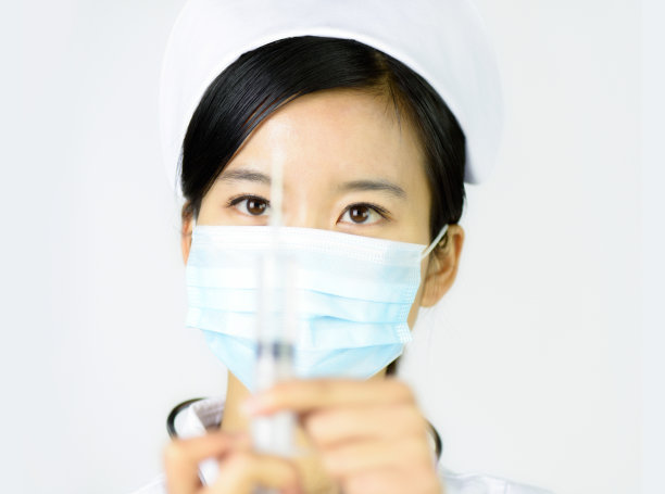 美丽的护士在一个白色孤立的背景素材图片