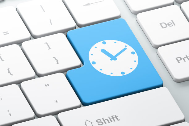 白色电脑键盘上的蓝色时钟图片下载