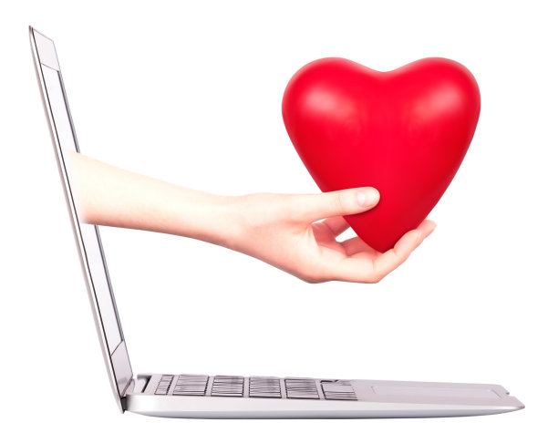 手与心礼物和笔记本电脑图片下载