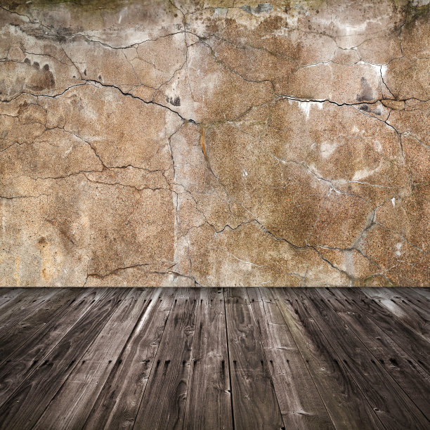 陈旧的室内背景。混凝土墙面和木地板图片下载
