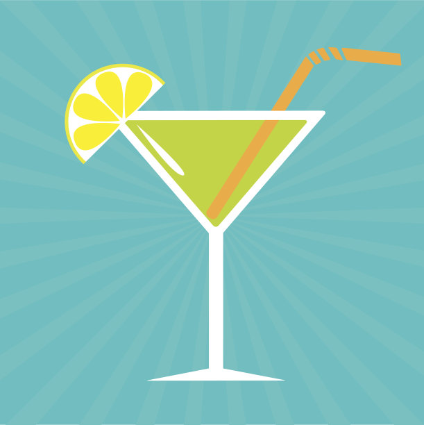 马提尼酒杯中的鸡尾酒。阳光的背景。图片下载