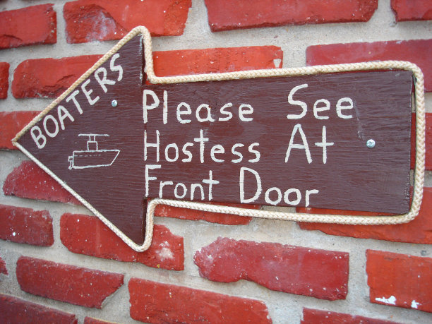 牌子上写着:游船者，请在前门见女服务员图片下载