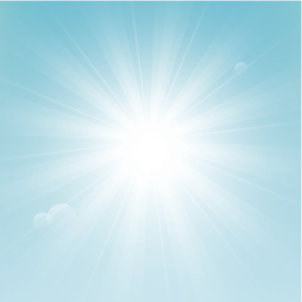 明亮的太阳在蓝色的天空背景图片下载