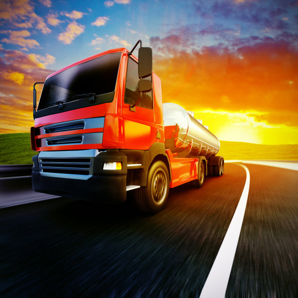 红色半挂车与生动的日落背景图片下载