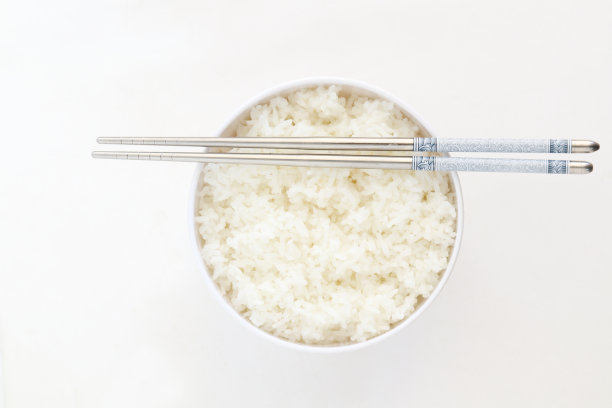 白碗里用筷子蒸米饭图片下载