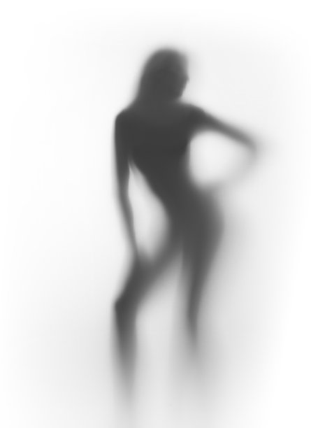 美丽和性感的女人在玻璃表面后摆姿势图片下载