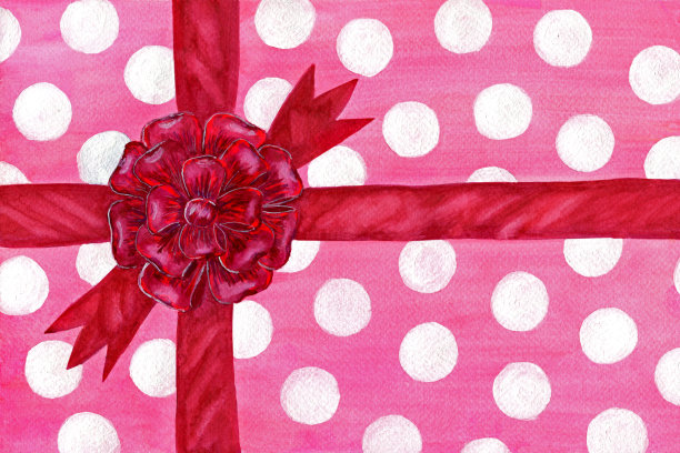 用带蝴蝶结的包装纸包装的礼物图片下载