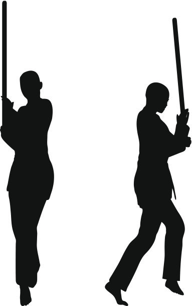 剪影的男人和女人在剑战空手道姿势图片下载