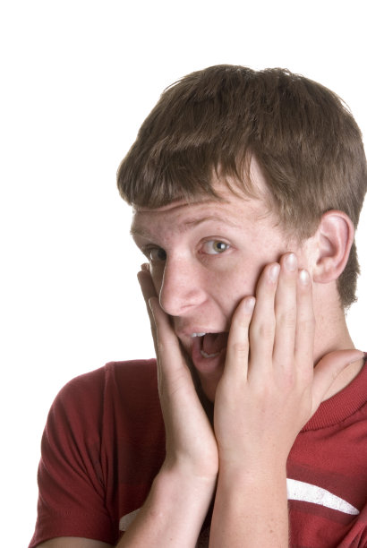 表情惊讶的青少年男性图片下载