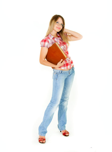 有吸引力的学生女孩与大的书在白色图片下载