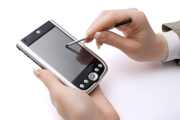 手握pda和触控笔的女人图片下载