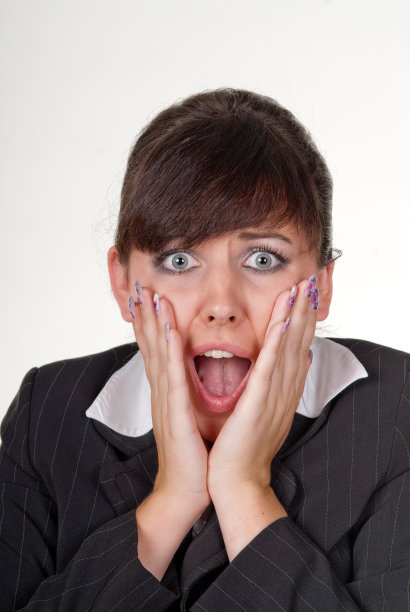 惊讶的年轻女商人图片下载
