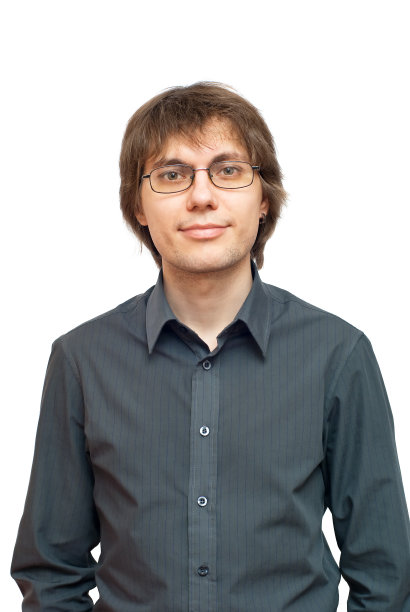 一个微笑的年轻商人的肖像图片下载