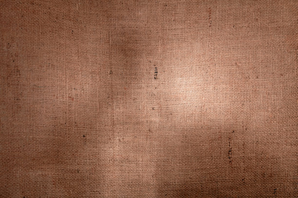 粗麻布背景与不均匀的光图片下载