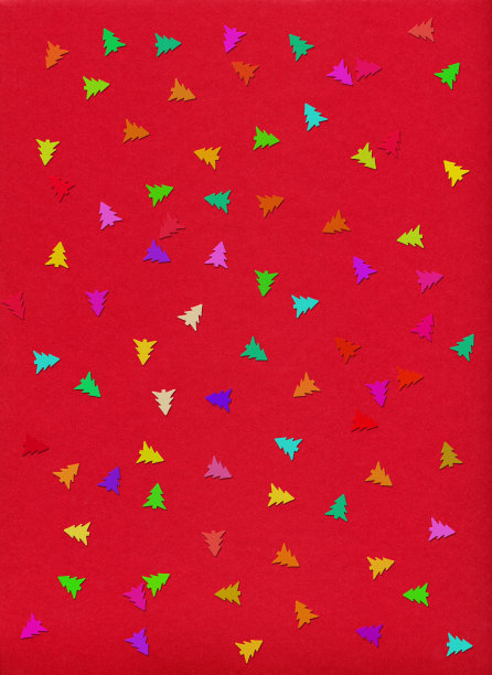 节日的背景。红色圣诞树上的五彩纸屑图片下载