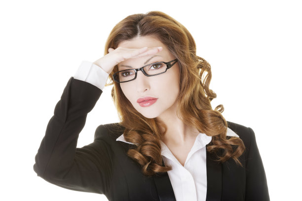 年轻的女商人，手放在额头上。图片下载