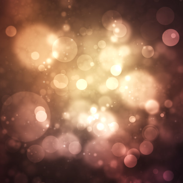 模糊的圆形灯光映衬着黑暗的背景图片下载