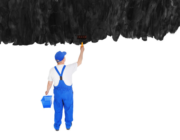 粉刷房屋的油漆工从后面遮住了看不见的墙图片下载