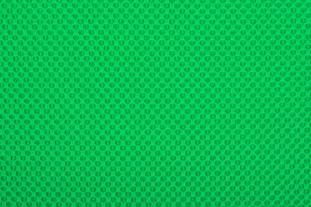 绿色带点的织物，背景。图片下载