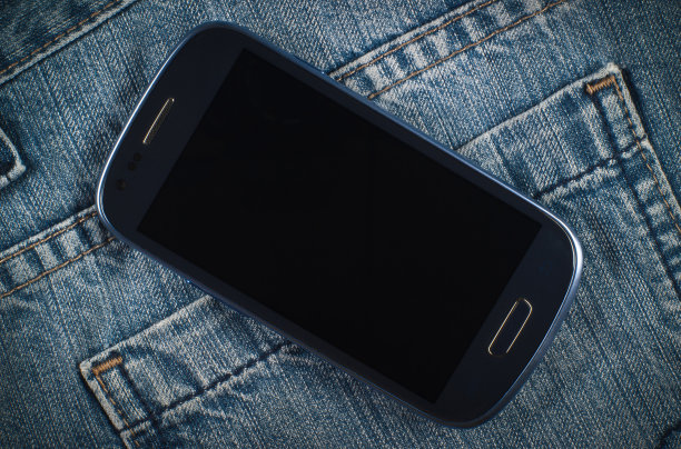 智能手机和牛仔裤图片下载