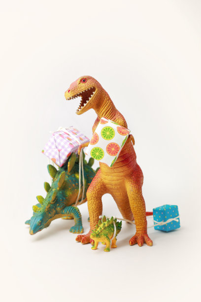恐龙携带礼品盒，复古背景。图片下载