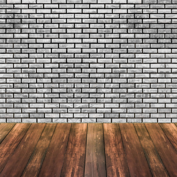 白色砖墙，深色木地板图片下载
