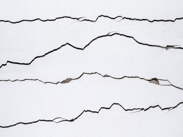 混凝土墙上的裂缝产生了线条图片下载