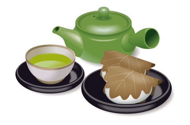 茶具。年糕包在橡树叶里。素材图片