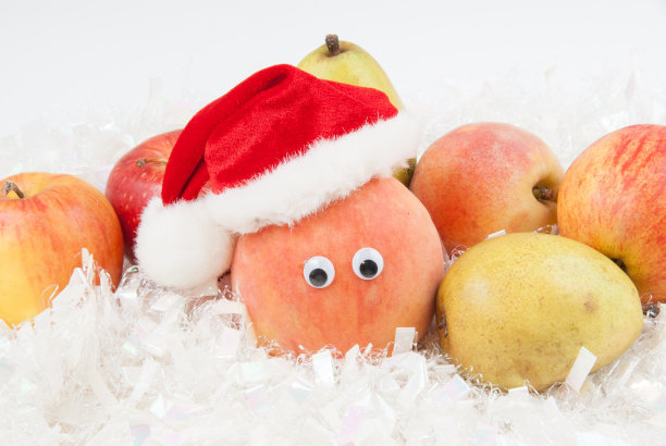 有眼睛的桃子和圣诞老人的帽子图片下载
