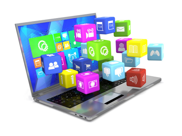 笔记本电脑和带有图标的飞行立方体。图片下载