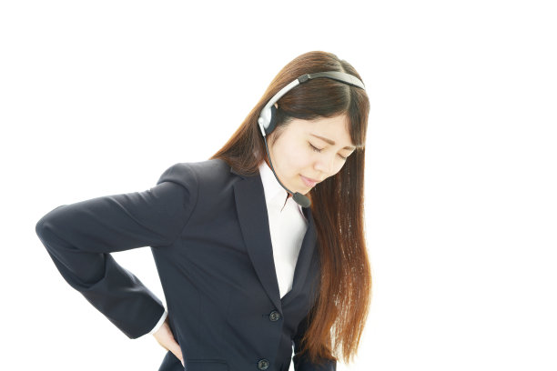 背痛的女商人。图片下载