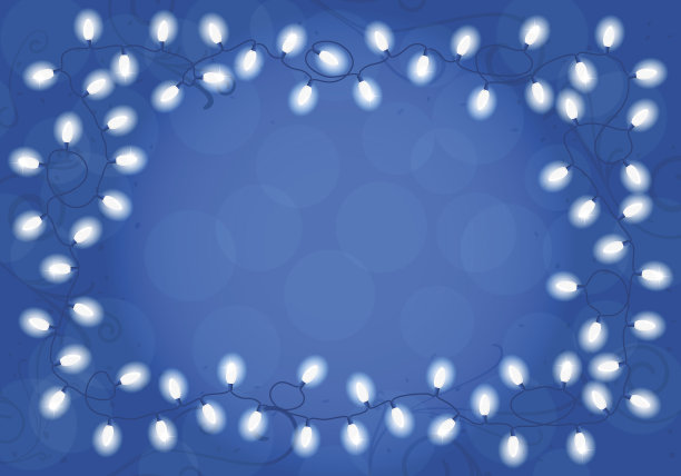 圣诞灯在蓝色背景与文字空间图片下载