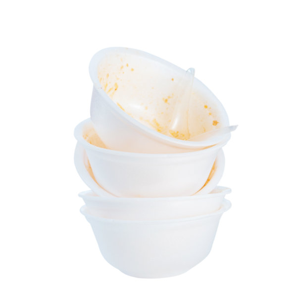 吃完后堆上泡沫碗和塑料勺图片下载