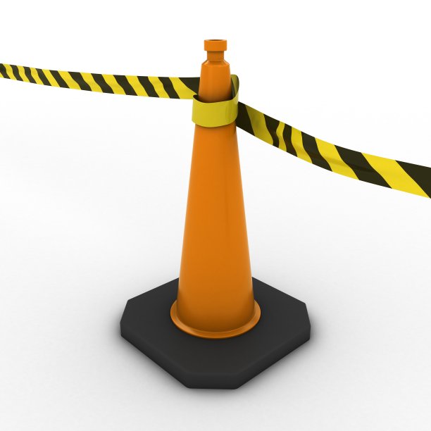 橙色交通锥与条纹危险胶带图片下载