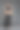 时尚模特穿着皮裤和夹克在灰色摆姿势图片下载