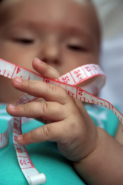 婴儿和磁带仪表图片下载