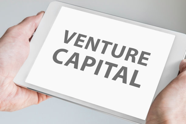 风险资本家的文字显示在现代平板电脑的触摸屏上图片下载