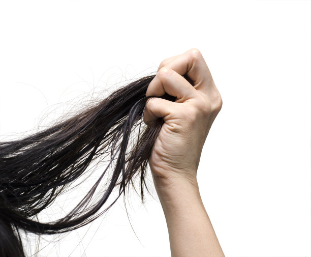 女人的手压头发压力在白色的背景图片下载