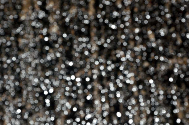 模糊的照片，一个潮湿的地面与光反射图片下载