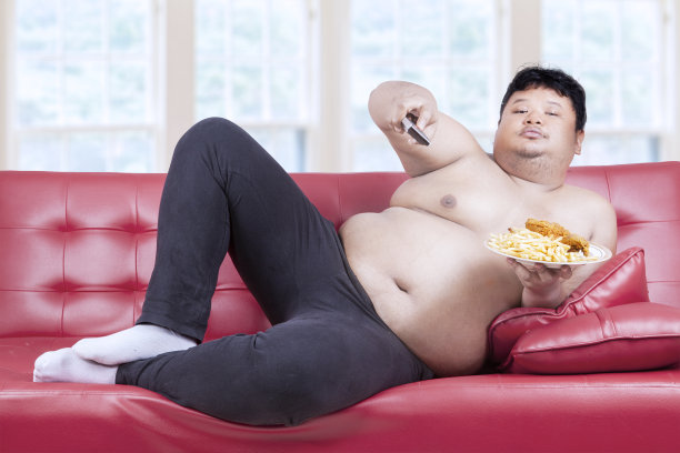 肥胖的人吃快餐图片下载