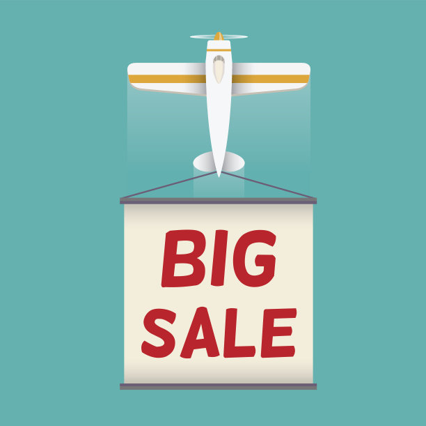 挂着“大减价”横幅的双翼飞机图片下载