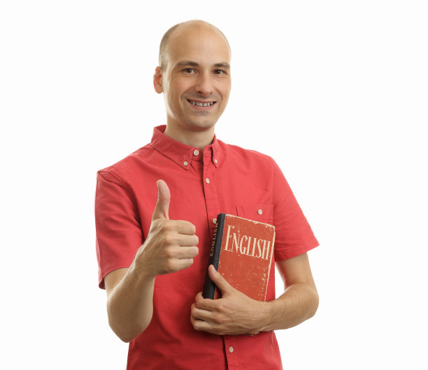 教育的概念。学习英语。有书的帅哥。图片下载