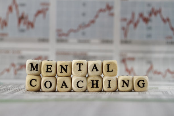 心理辅导建立在报纸背景的字母立方体图片下载