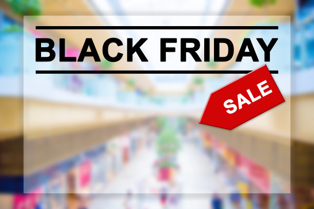 模糊的购物中心背景上的黑色星期五文字图片下载
